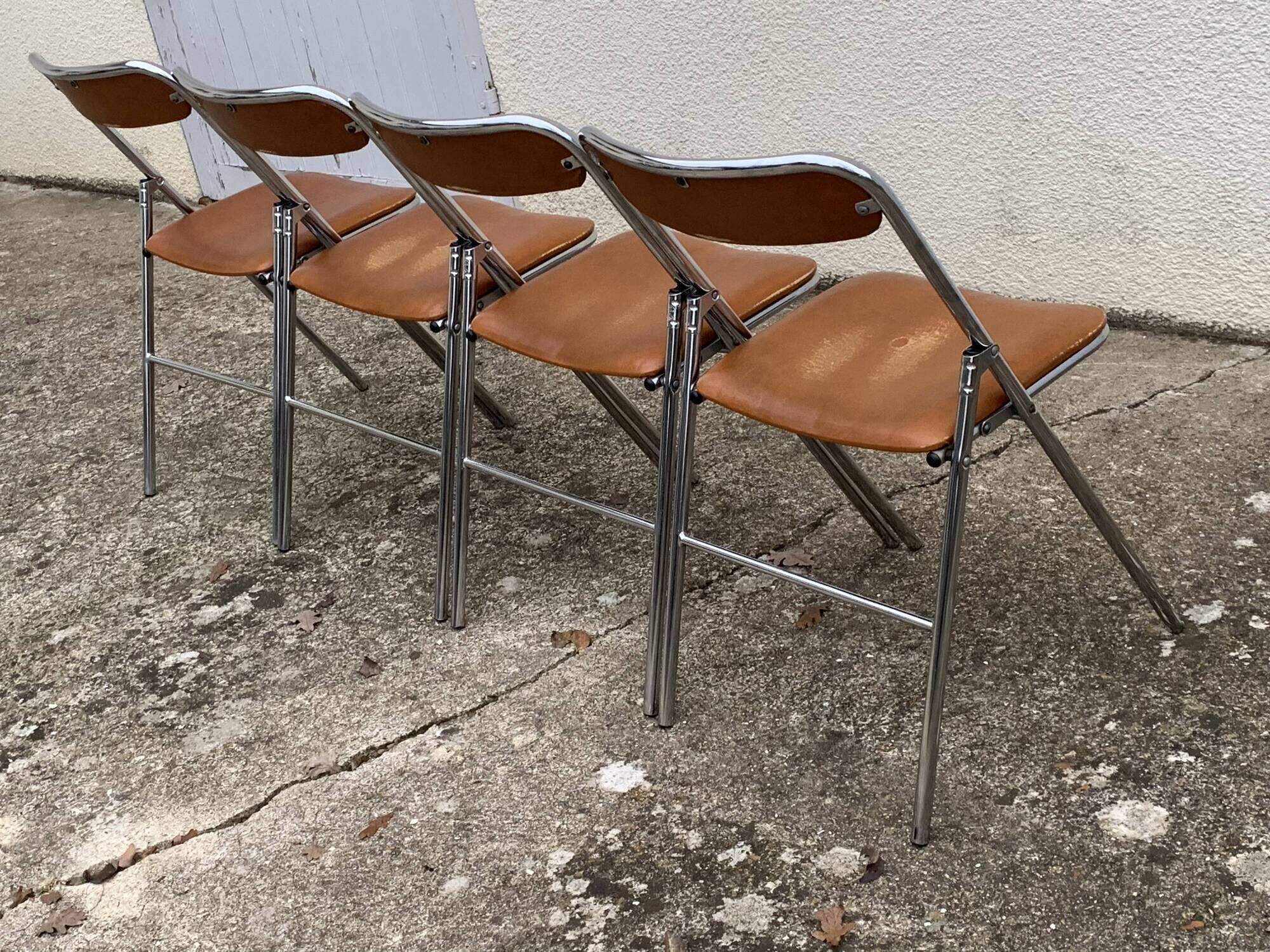 4 folding chairs chromed metal and Skaï fawn 1970