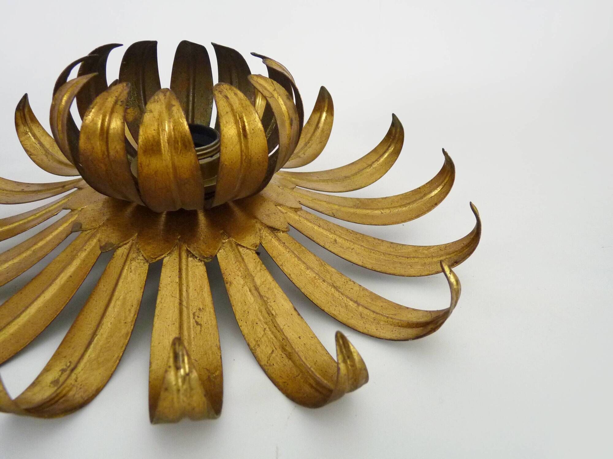 Pair of palm tree wall lights in gold metal. 70s