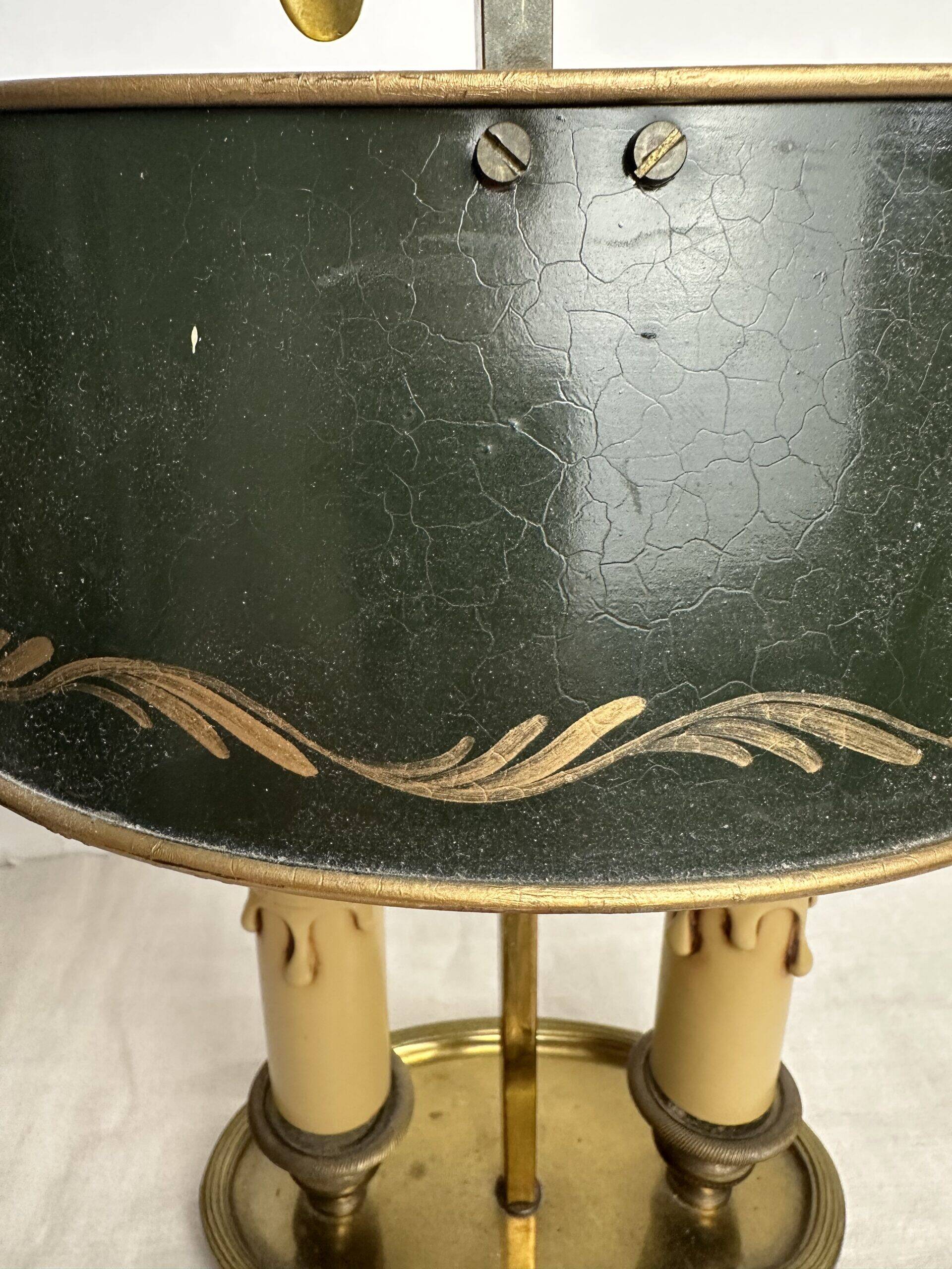 A pair of old brass bed warmers.