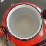 Red enamelled sheet metal kettle