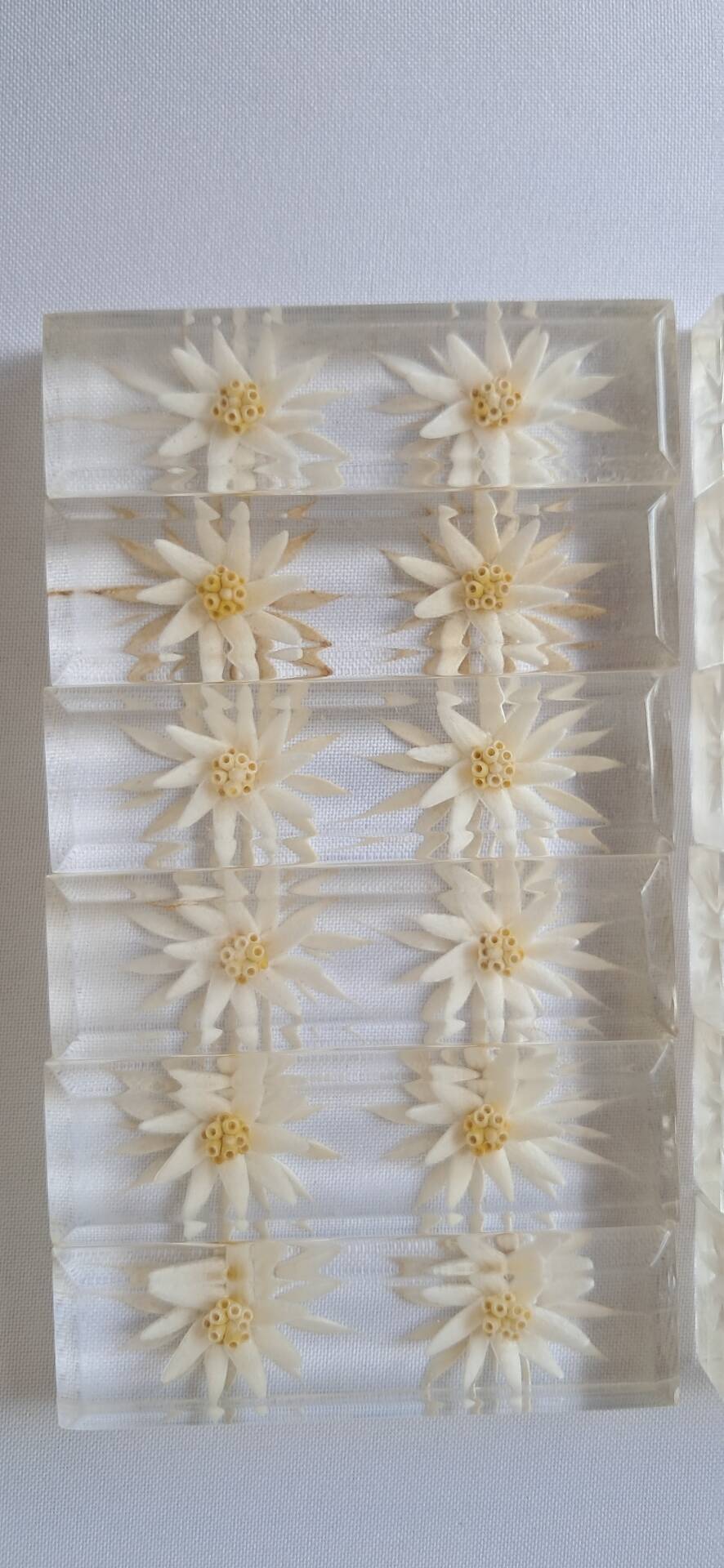 12 knife rests with resin inclusion. 1970s.