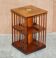 Sheraton Revival rotating library table in mahogany and satinwood.