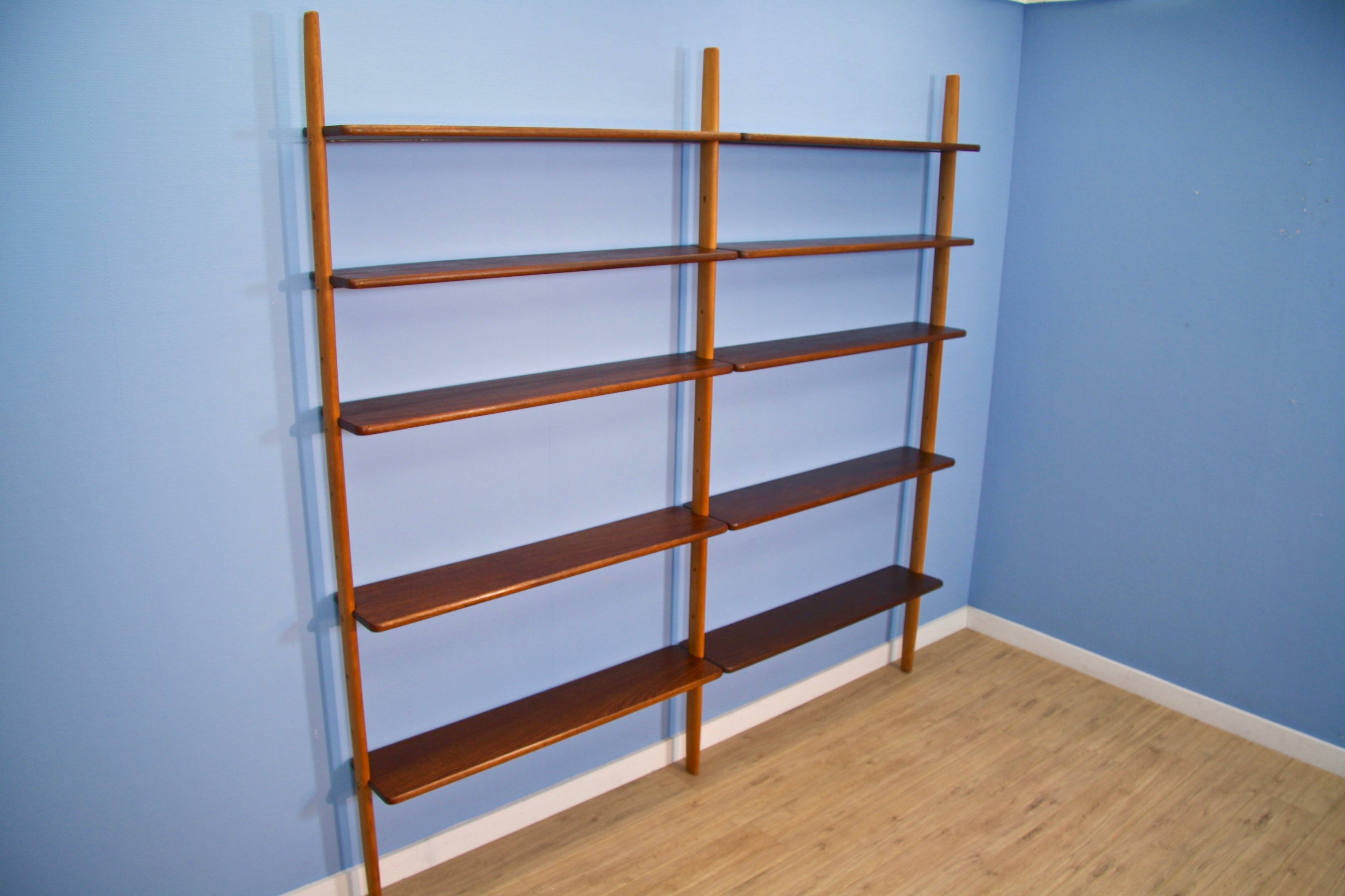 A Danish wall unit in teak and beech by William Watting for Scanflex, 1950s.