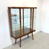Elegant, curved display cabinet in Art Deco style