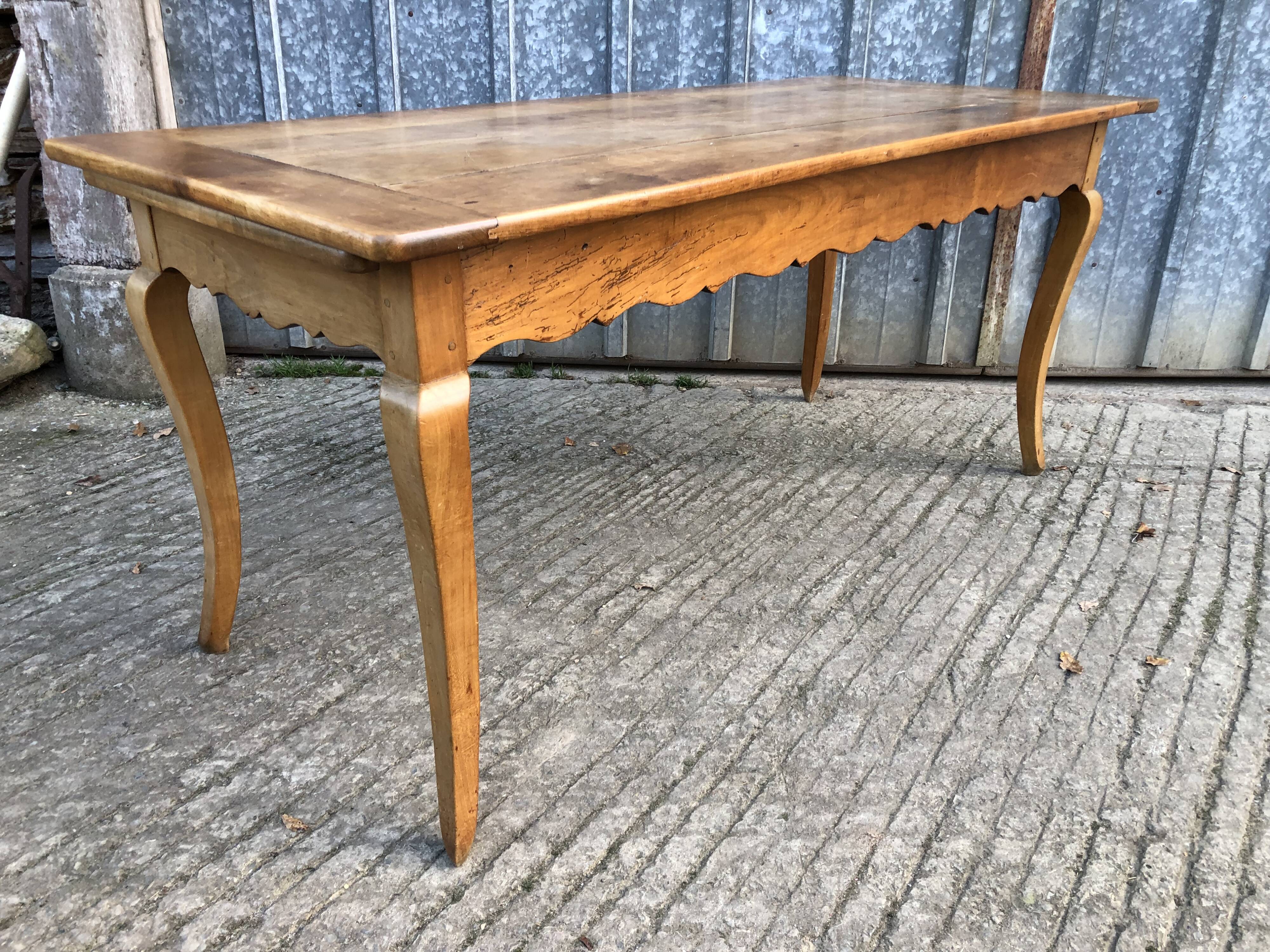 Antique Louis XV style farmhouse table in solid cherry wood.