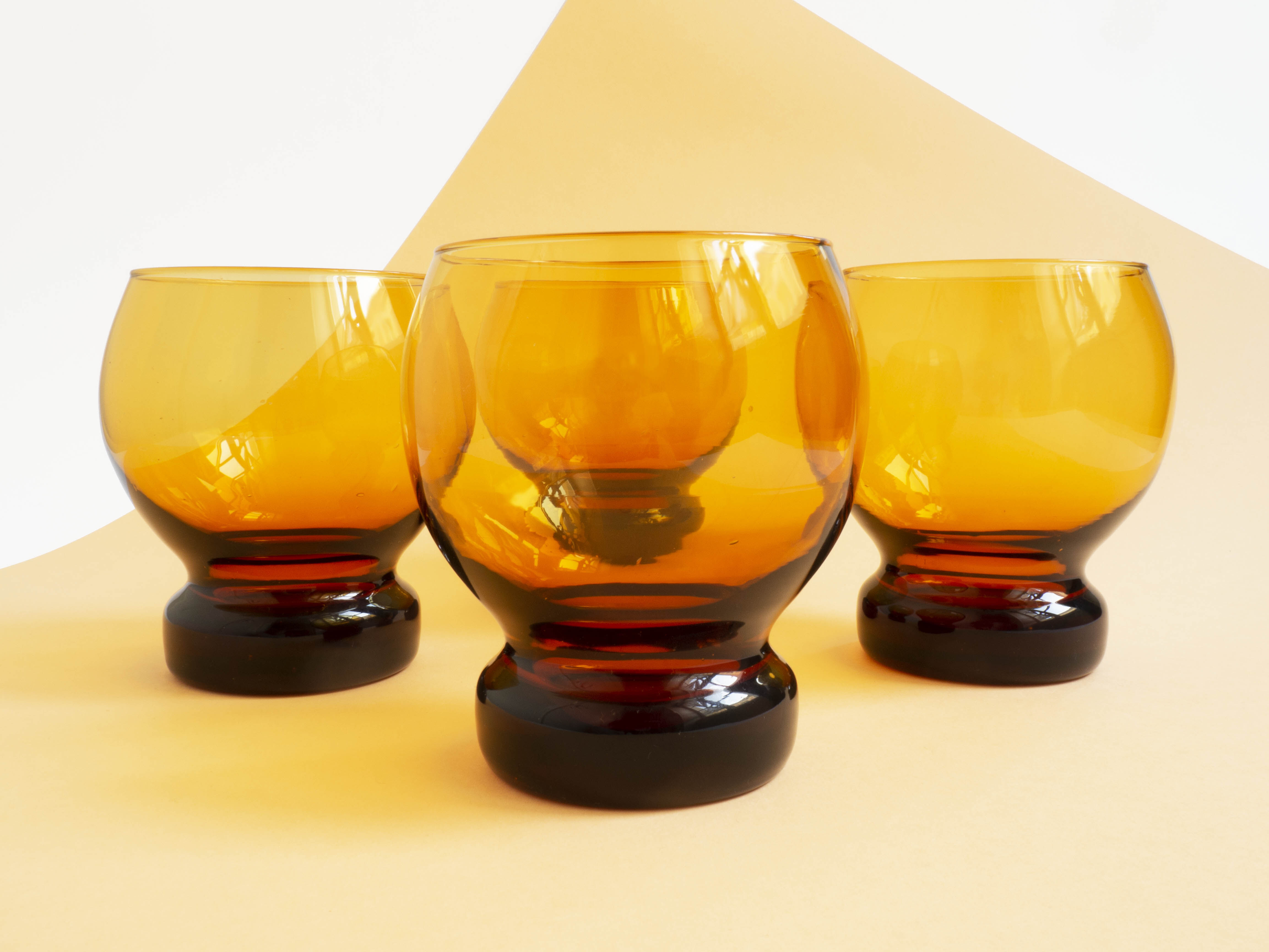 Large glasses or cups made of vintage smoked glass
