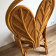Chaise rotin dossier à forme de feuille