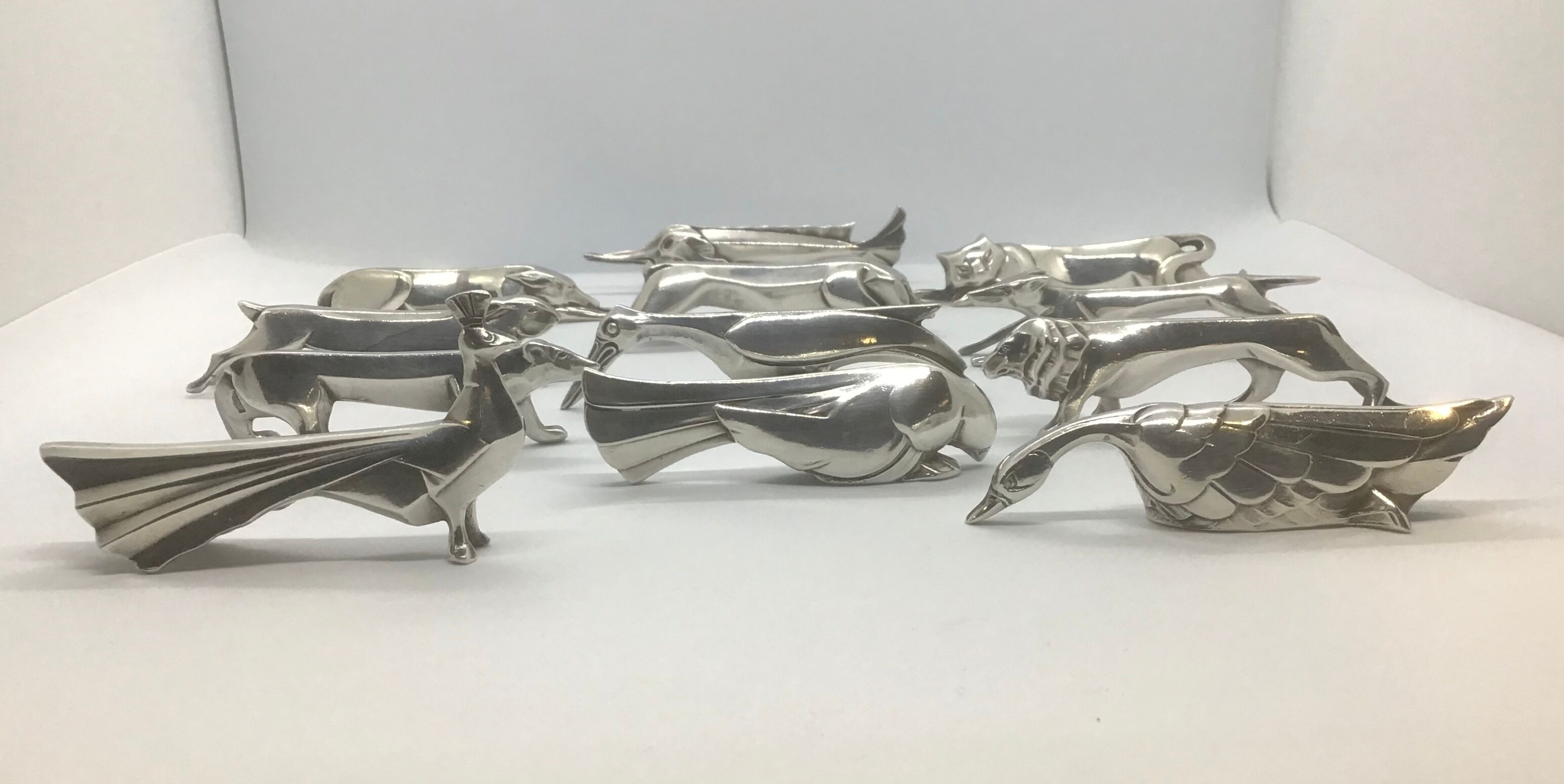 12 knife holders by Edouard Sandoz for the Goldsmith Gallia-Christofle