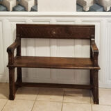 Stylized church pew, early twentieth century, solid wood