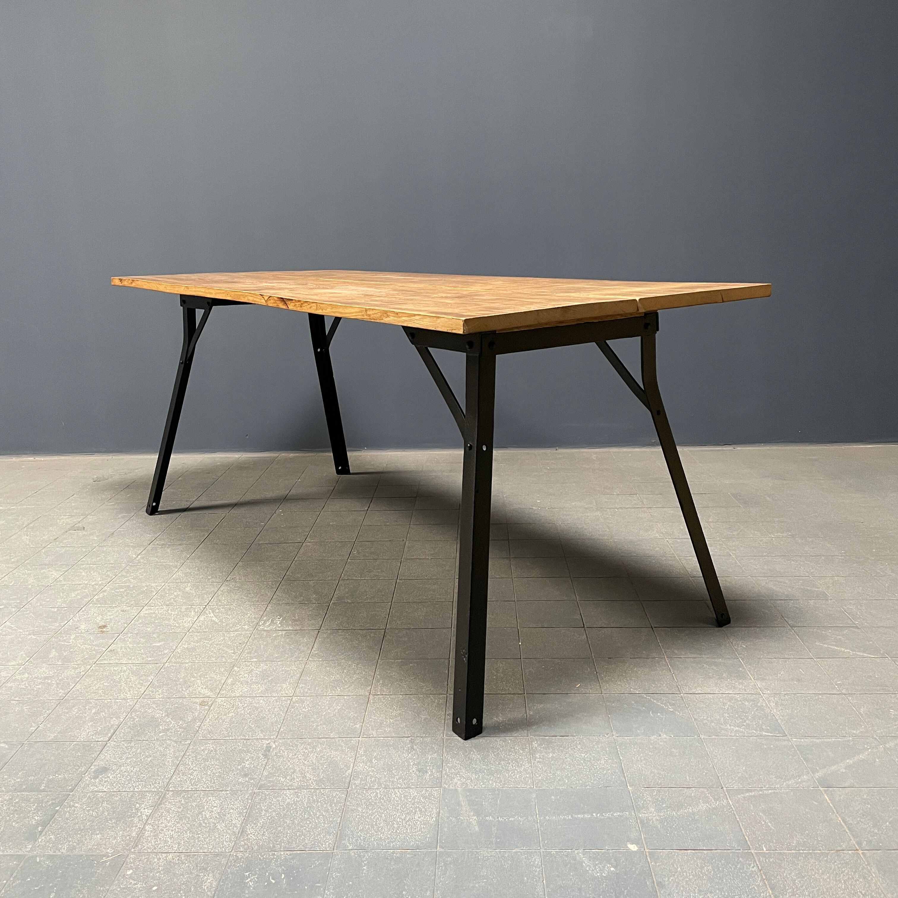 Handmade industrial oak dining table with black metal legs
