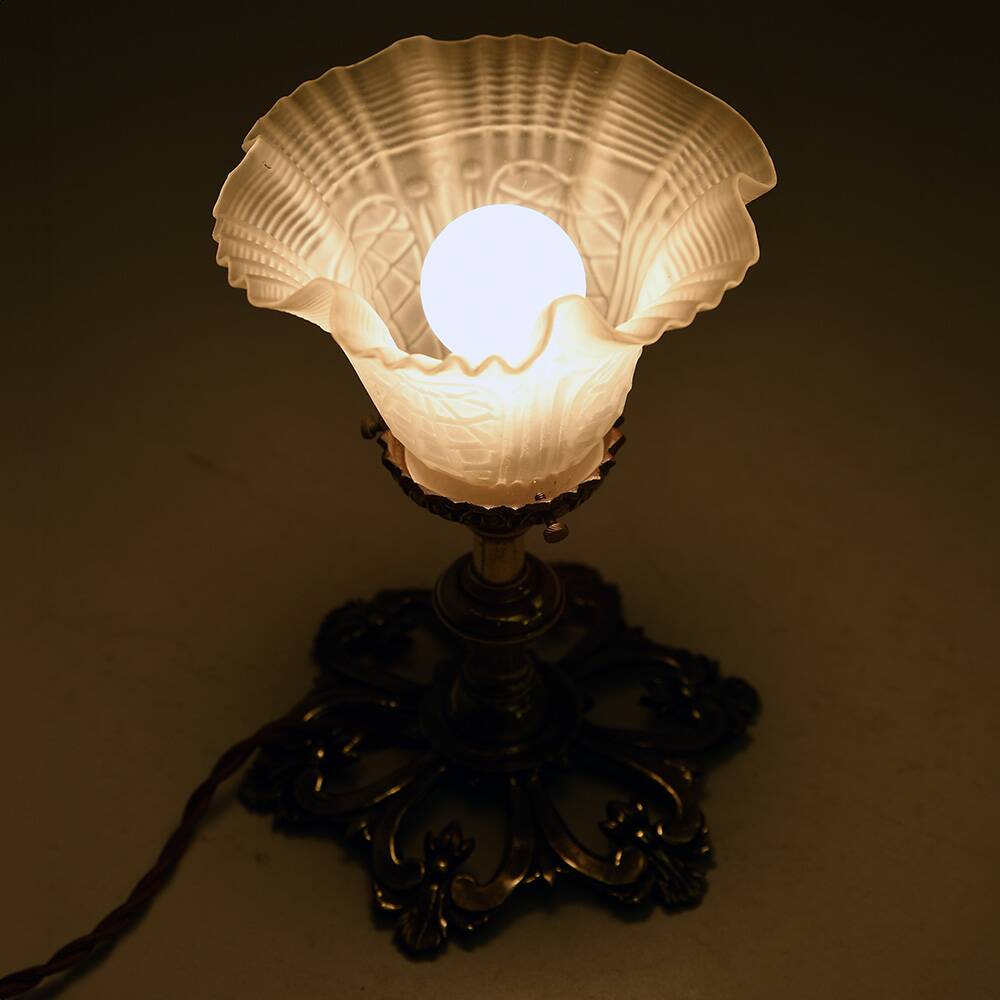 Brass and molded glass table lamp