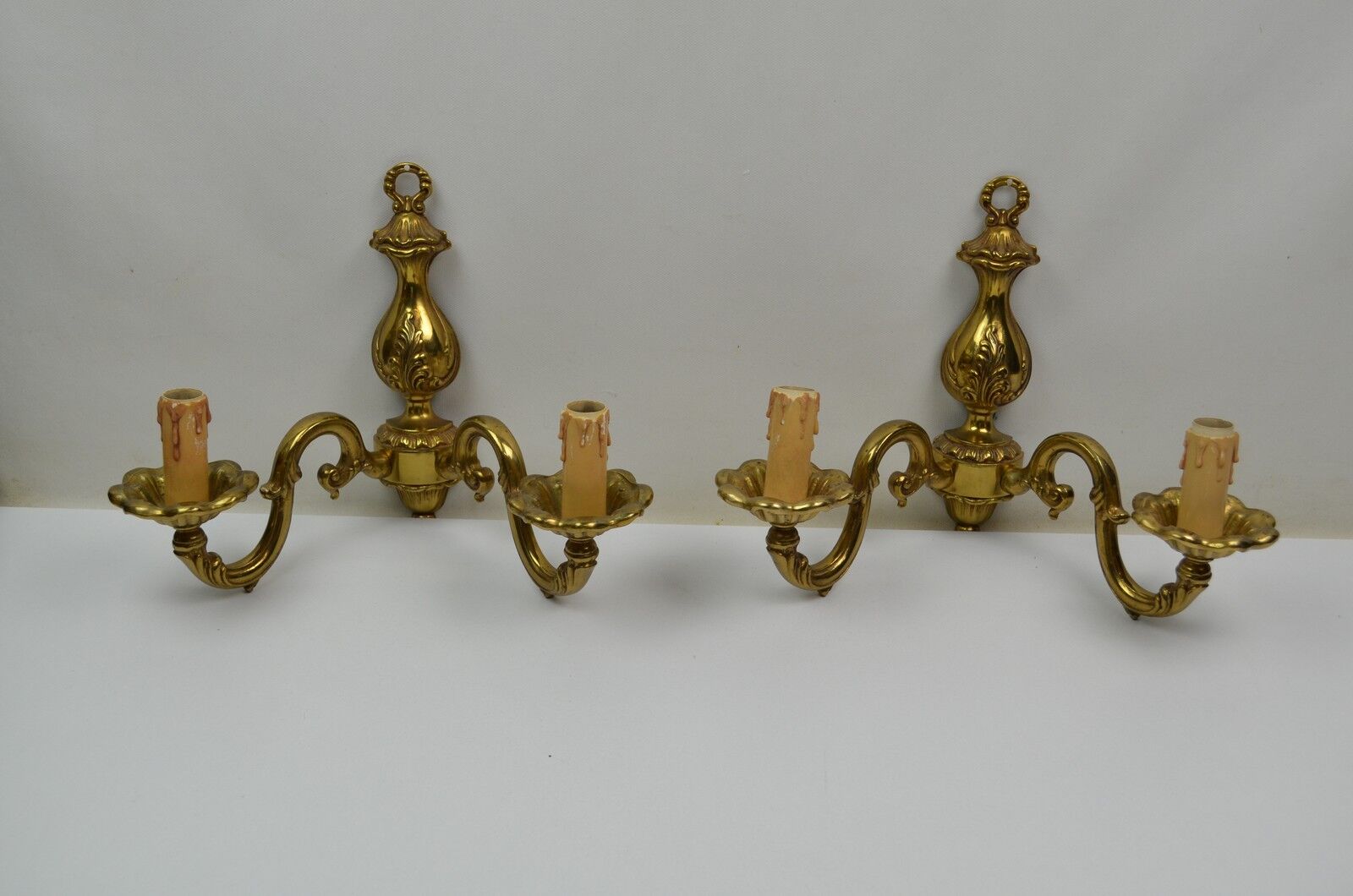 Pair of wall lamps with two lights in Louis XV style bronze