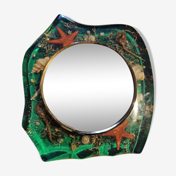 Mirror on resin support with inclusion