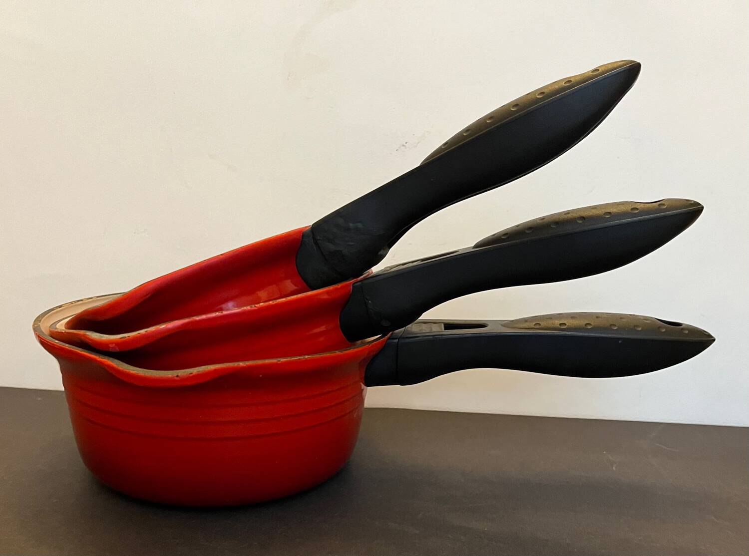 Series of 3 cast iron Le Creuset saucepans