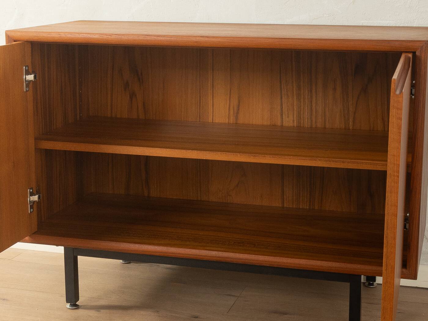 Classic chest of drawers from the 1960s with practical, closed storage space