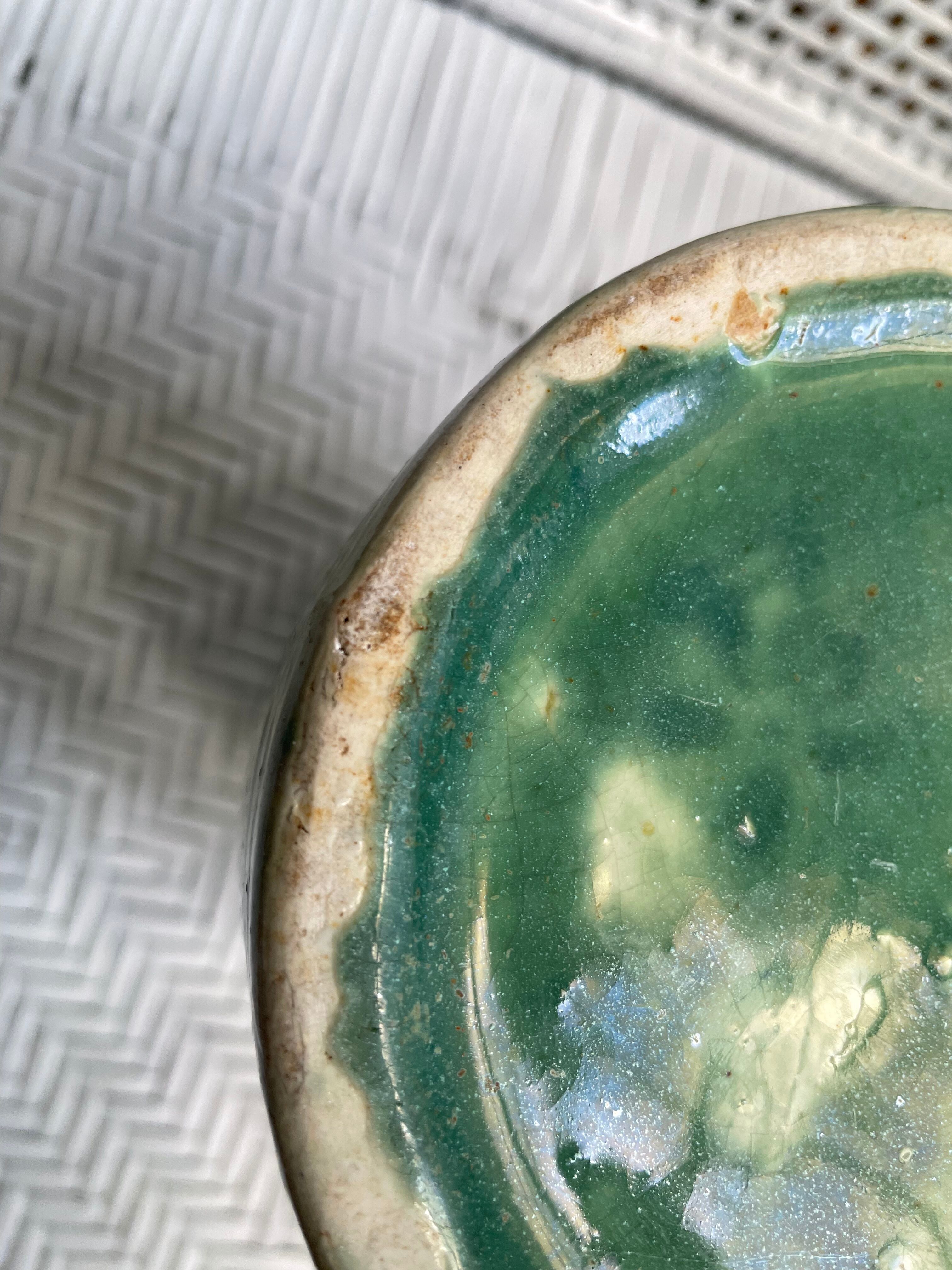 Turquoise green enamelled ceramic pitcher