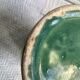 Turquoise green enamelled ceramic pitcher