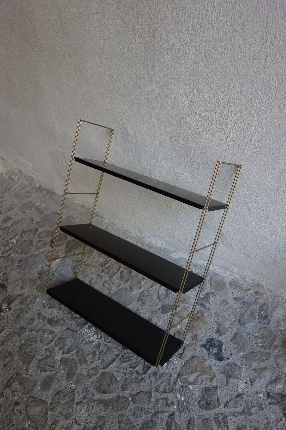 Golden wall string shelf