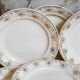 Eight Villeroy & Boch dessert plates with gold decor