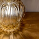 Baladeuse tulipe vintage en verre ambré