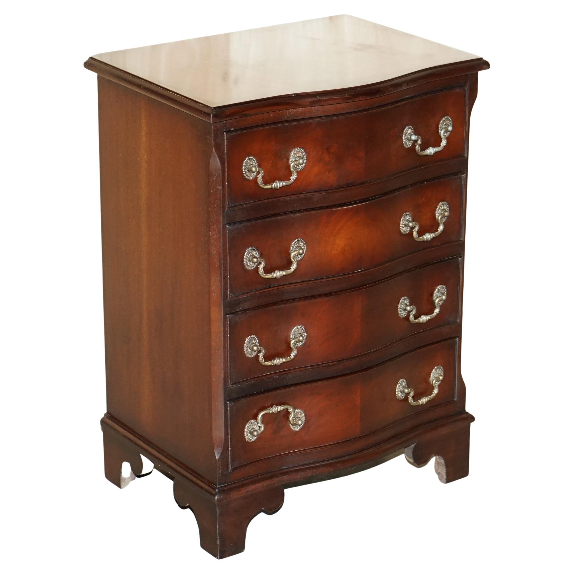 Vintage serpentine front hardwood chest of drawers