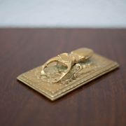 Scarab brass mail clip
