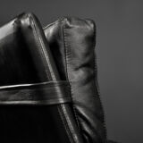 Mid-century danish modern minimalist black leather swivel armchair by georg thams, 1960s