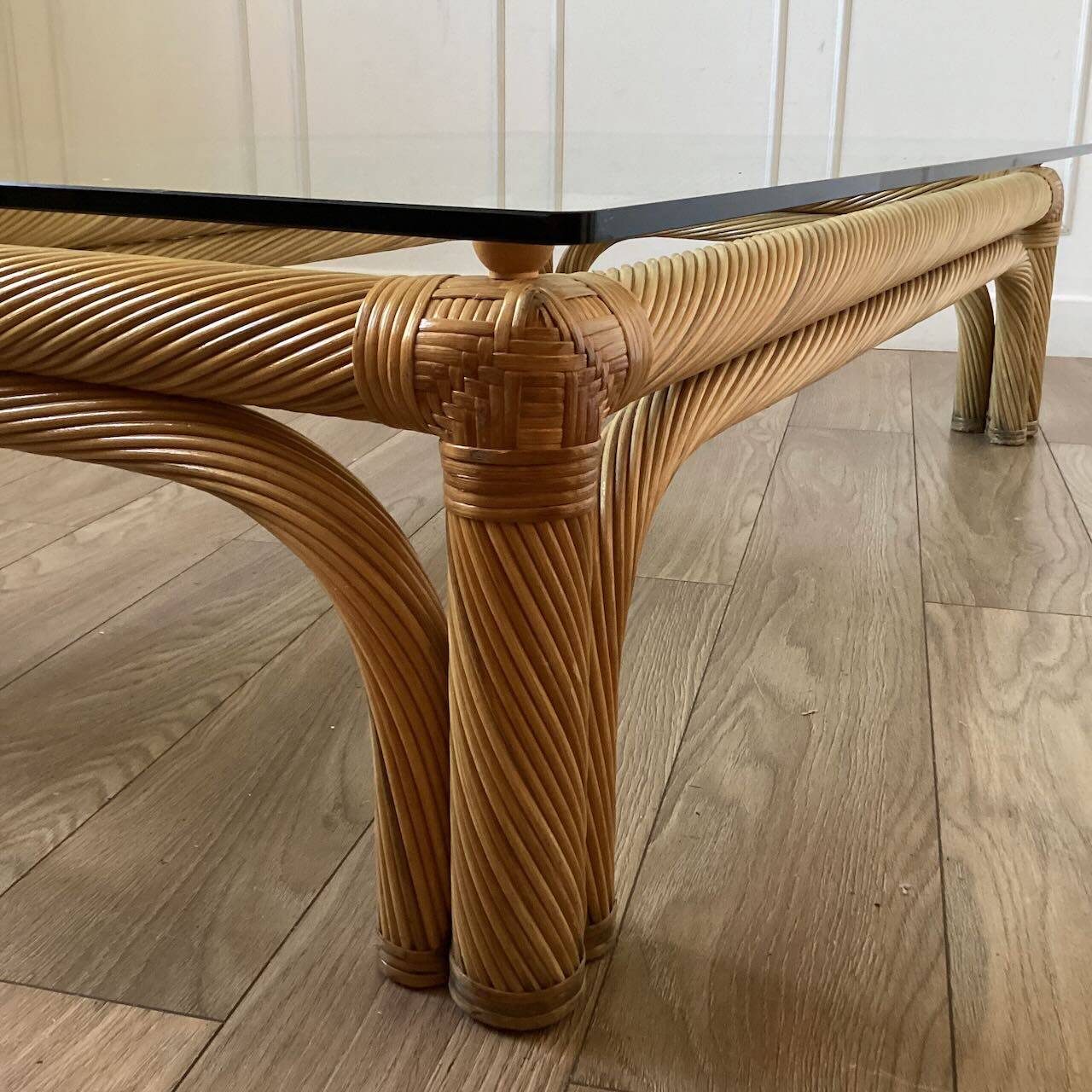 Large rattan and glass coffee table