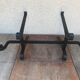 Ancient cast iron log carrier