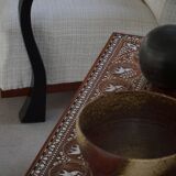 Vintage Indian teak coffee table inlaid with elephant motifs, mid-20th century.