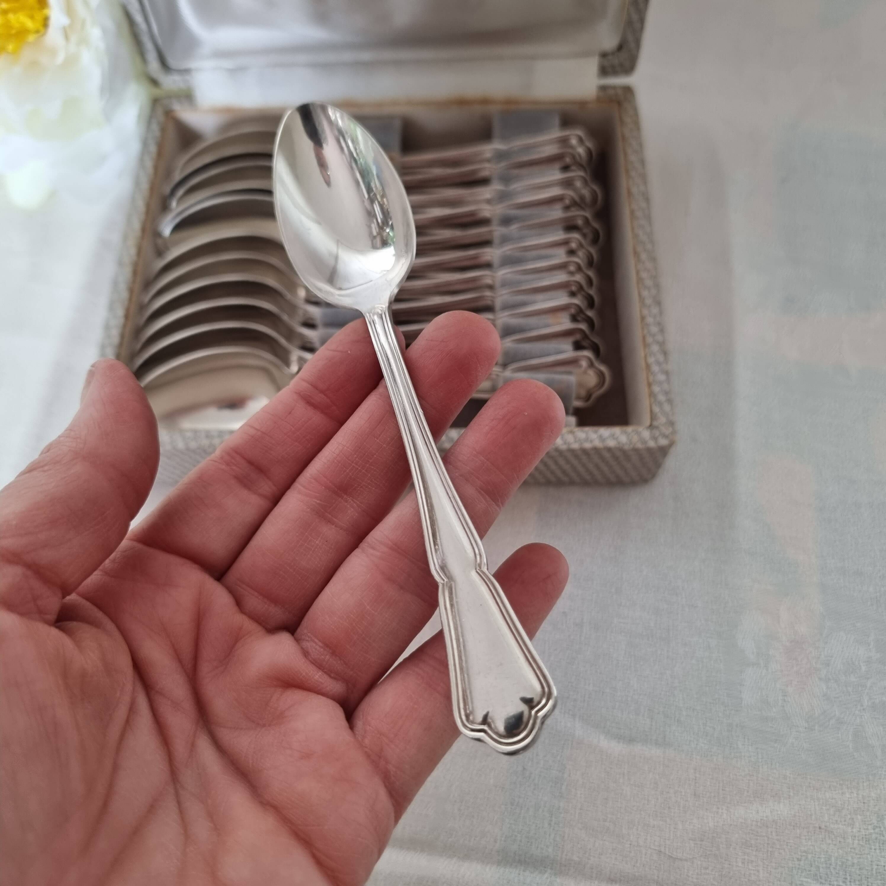 Set of 12 silver-plated coffee or dessert spoons from the E brand