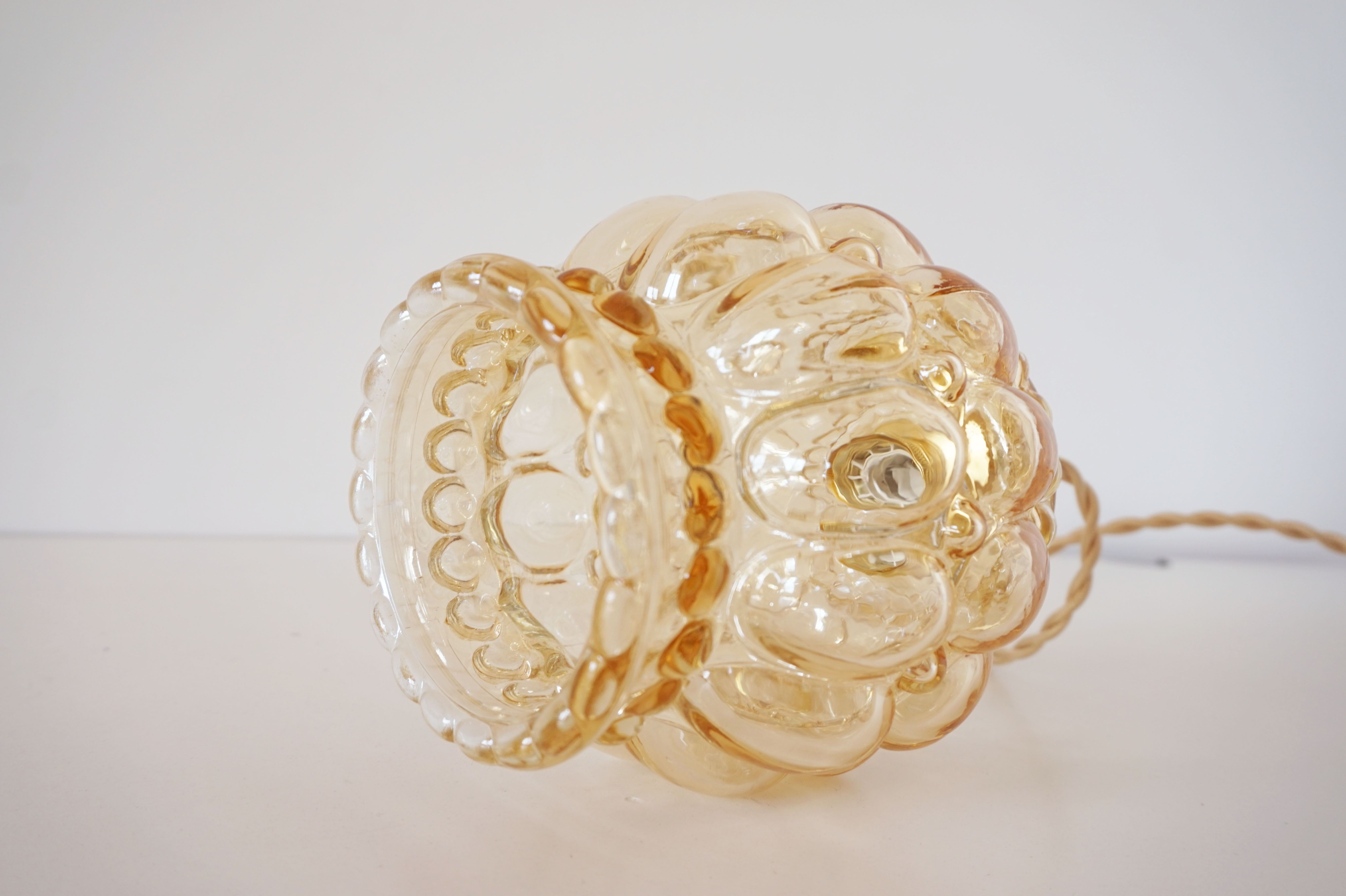 Vintage molded glass globe player