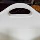 Design magazine rack in milky white by Elie Jacobson