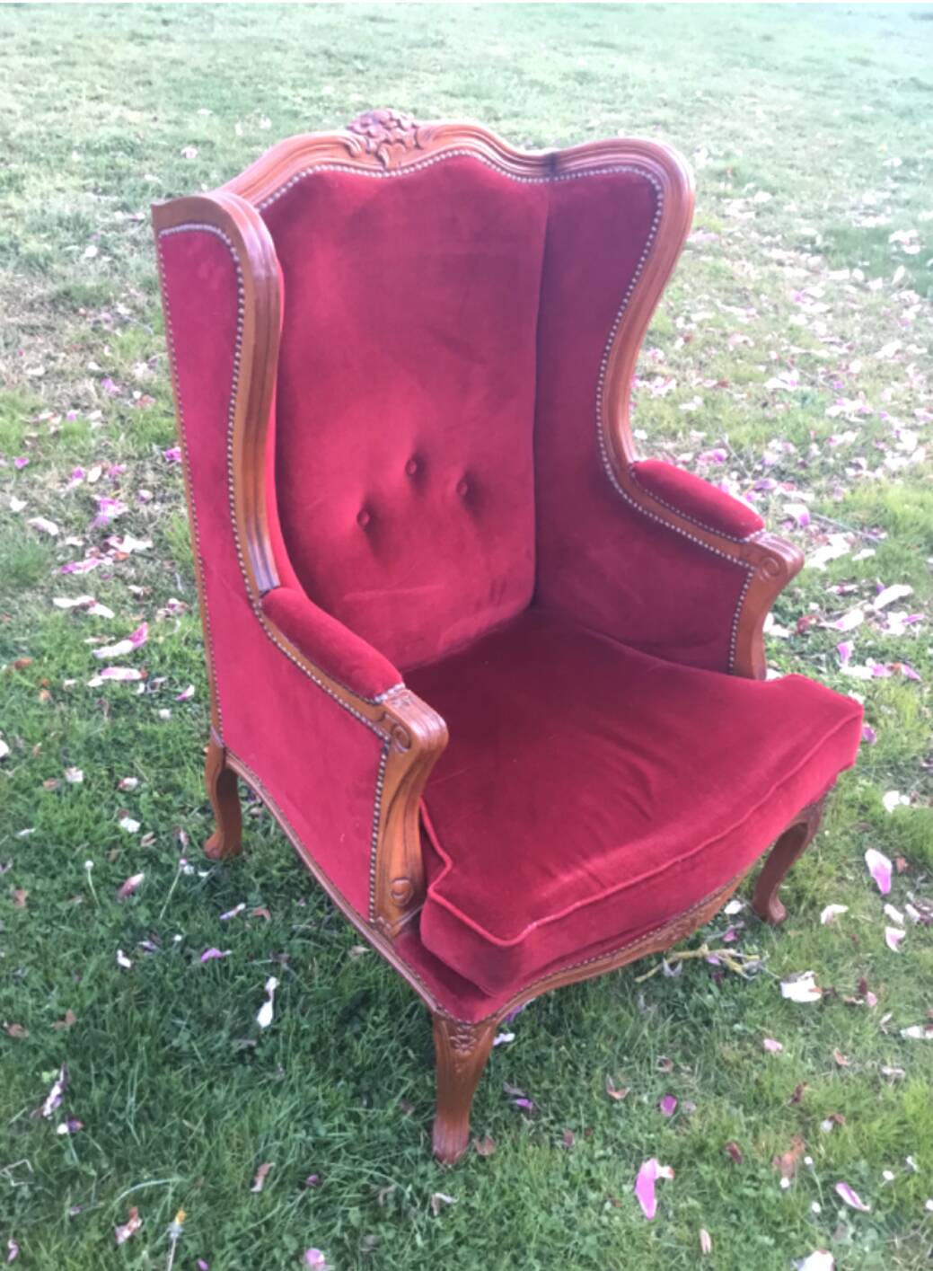 Louis XV style carved wooden shepherdess chair. Red velvet