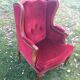 Louis XV style carved wooden shepherdess chair. Red velvet