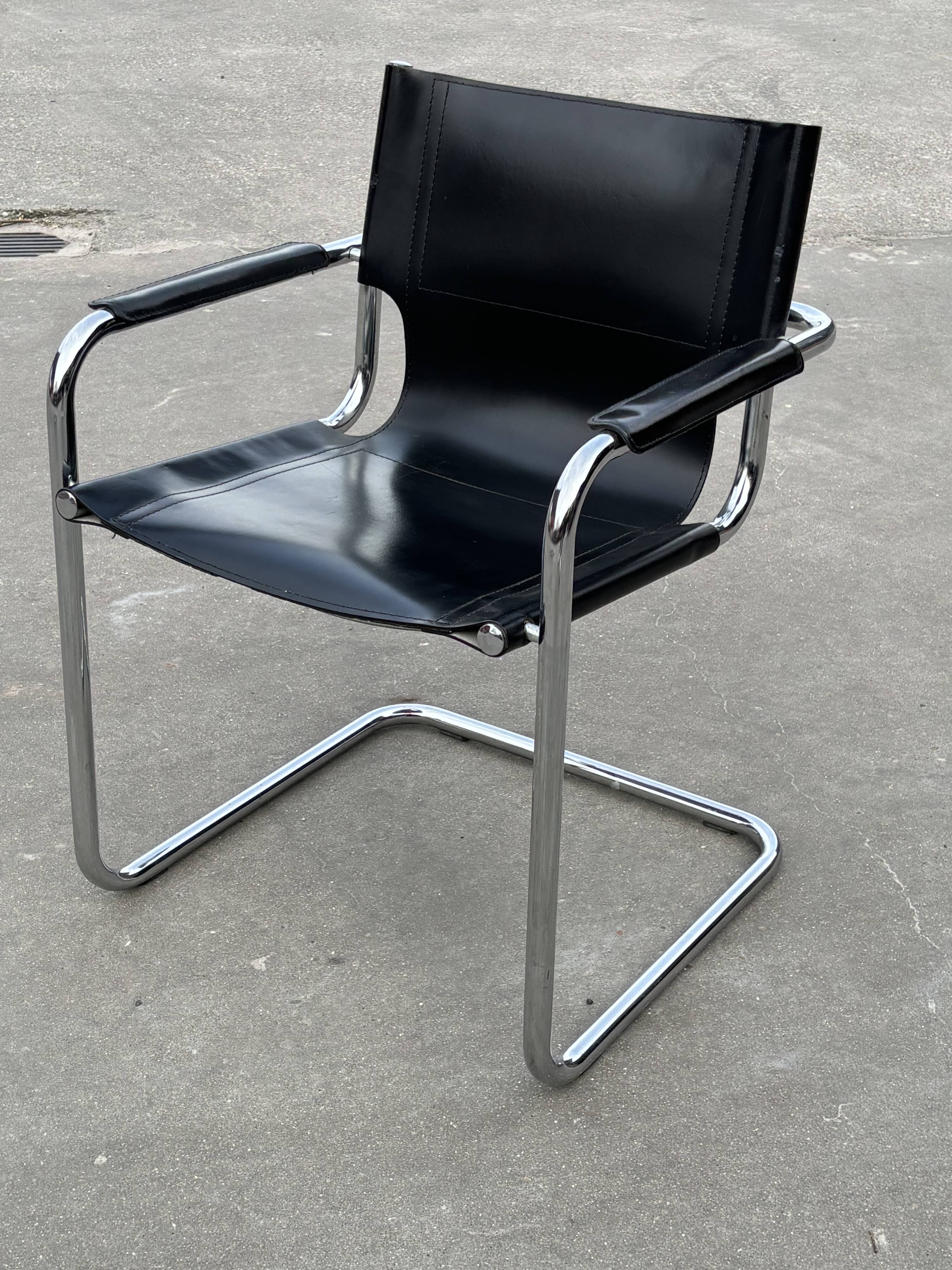 Set of 4 design cantilever chairs black and chrome design made in Italy