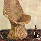 High-backed chair or shepherdess in vintage wicker