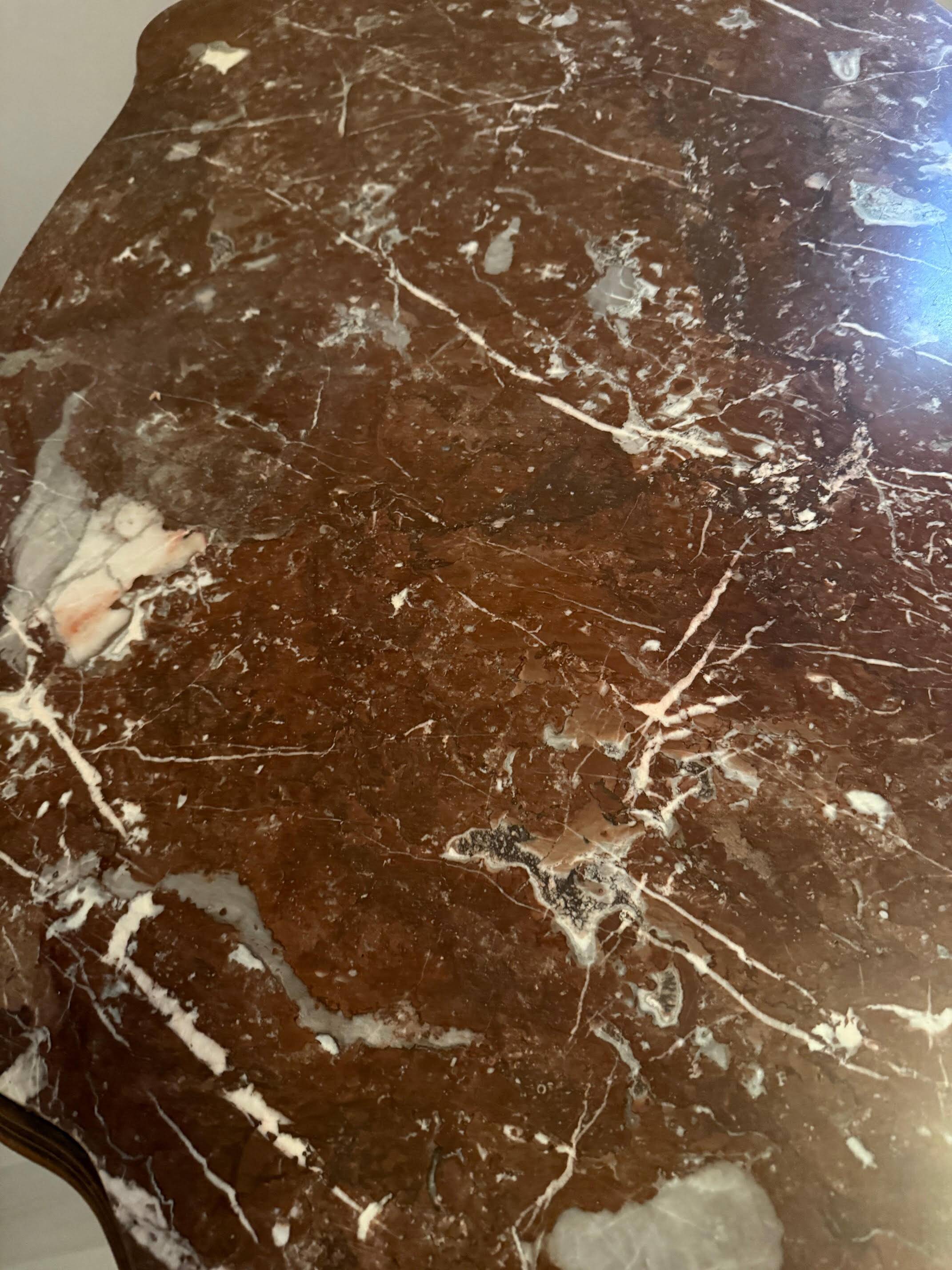 Violin-shaped oval pedestal table