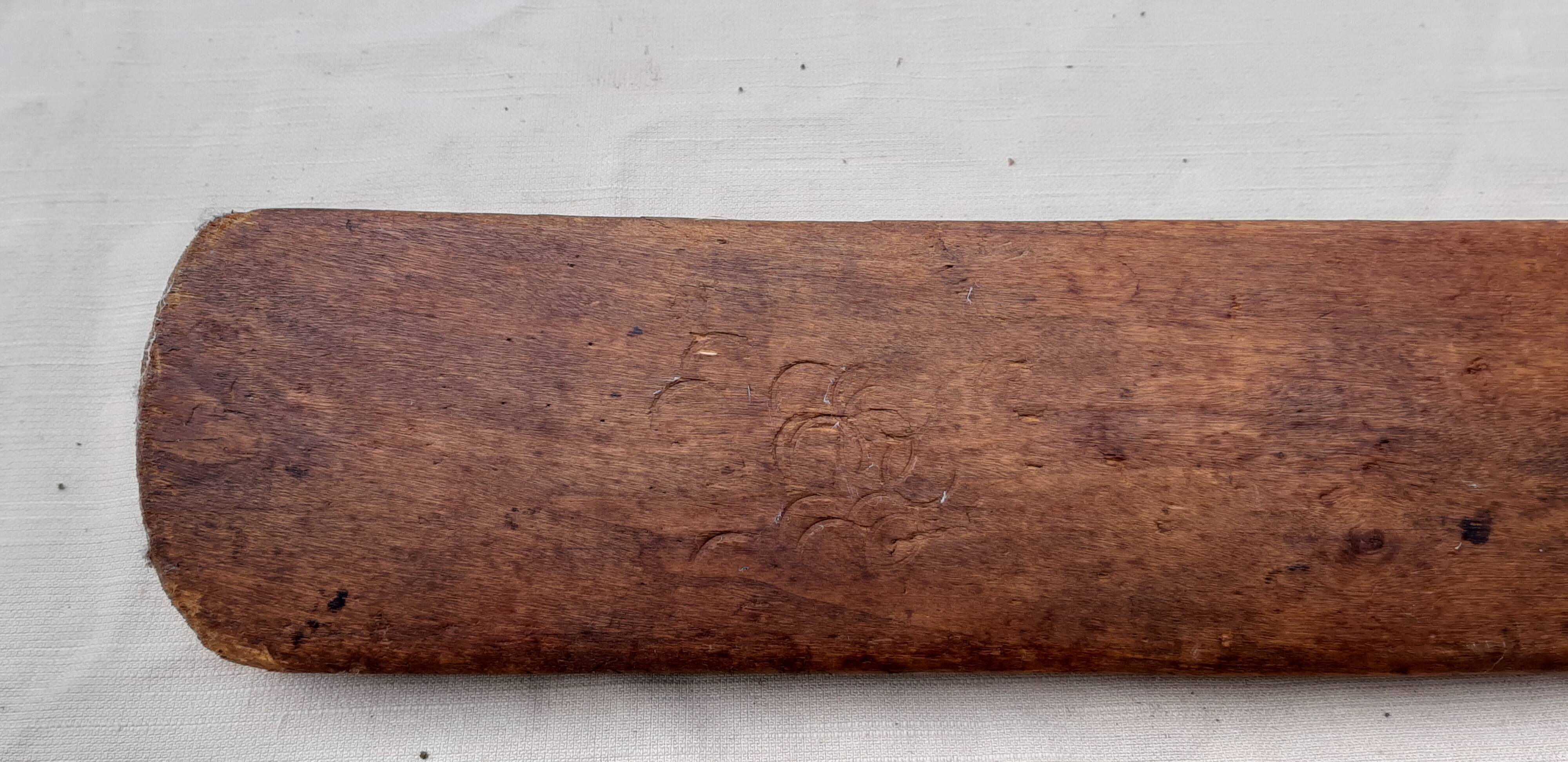 Ancient cricket bat in wood
