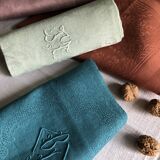 Set of four napkins dyed in multiple colors