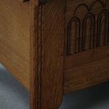 Modern Danish oak commode with decorative relief sculpture, mid-20th century.