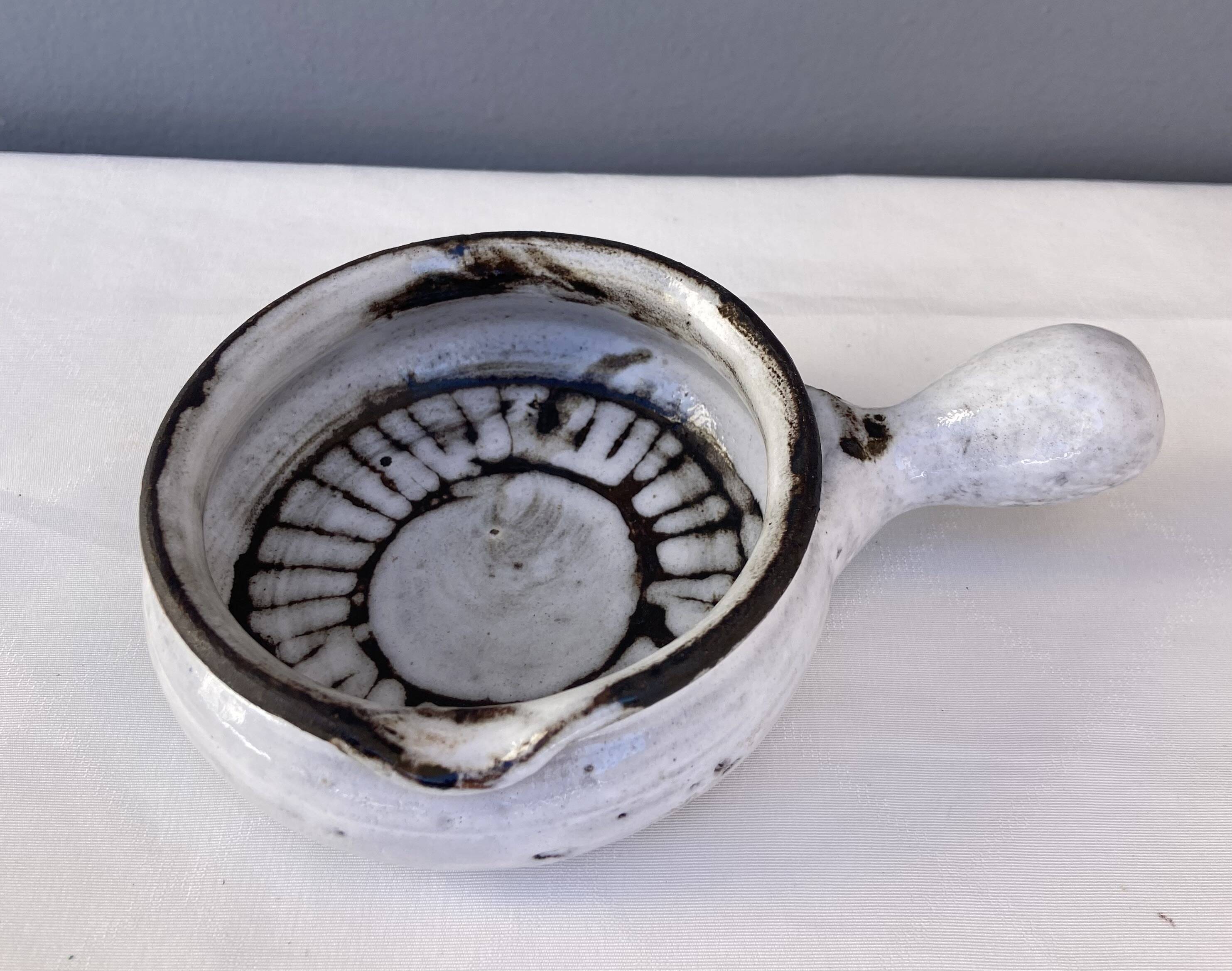 Two fondue pots by Albert Thiry