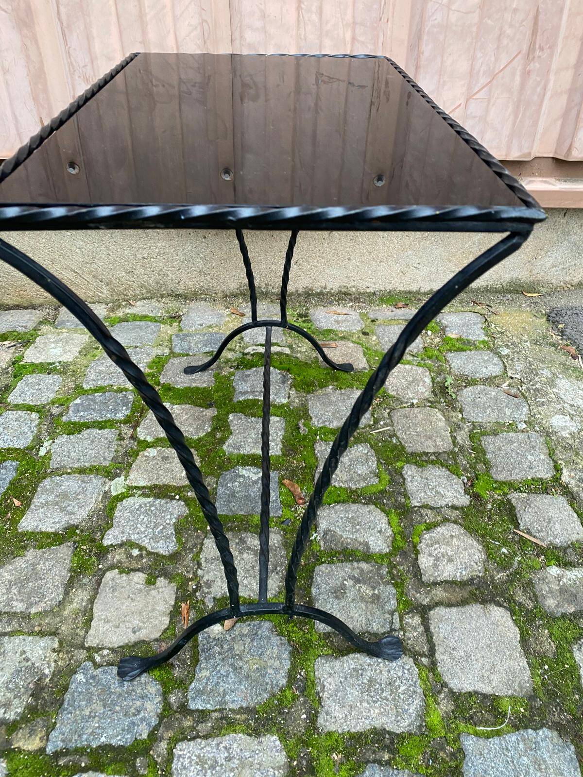 Coffee table/side table in the style of Jacques Adnet, made of steel and glass