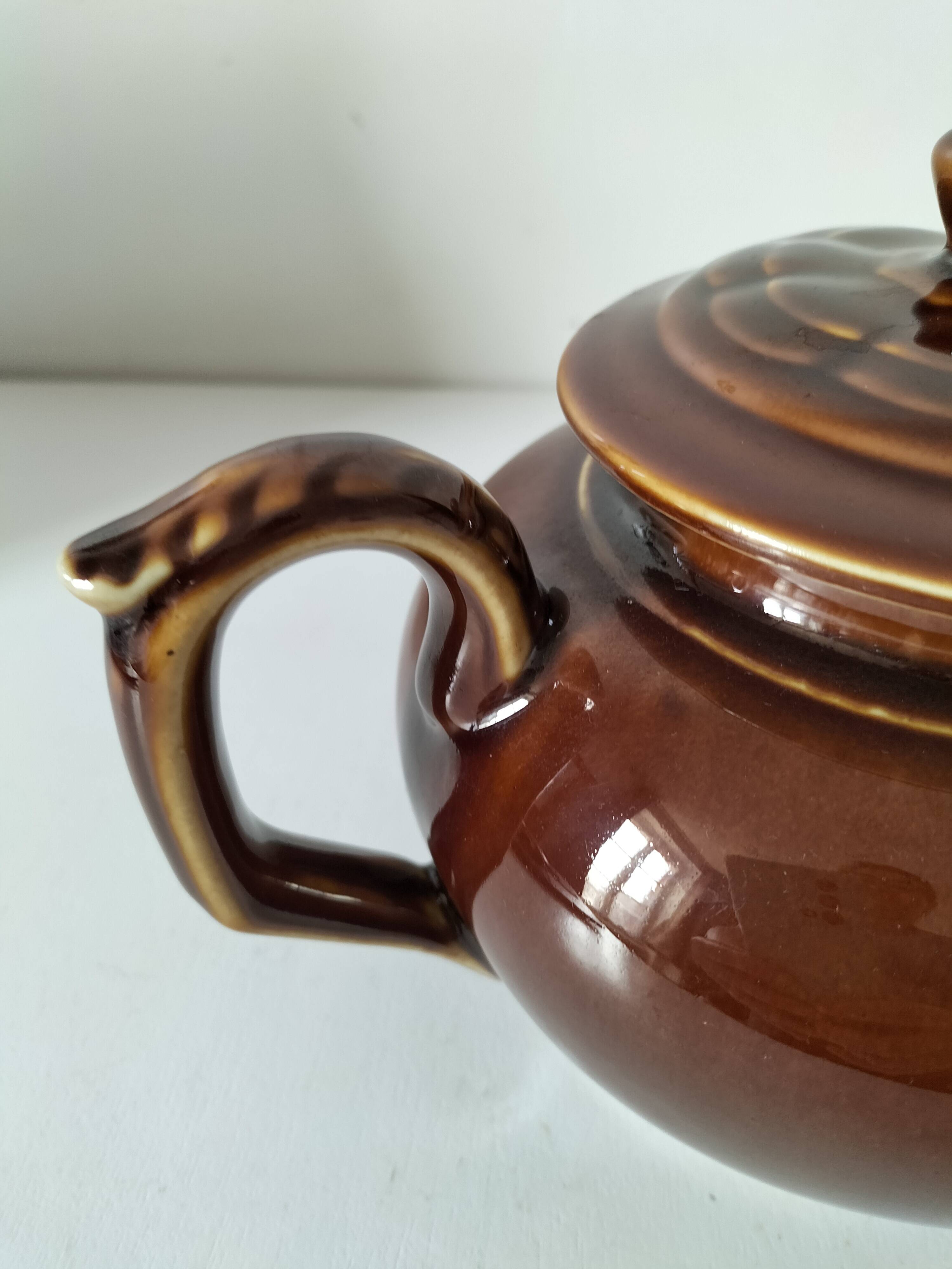 Vintage brown glazed earthenware teapot, mid-century sculptural decor.