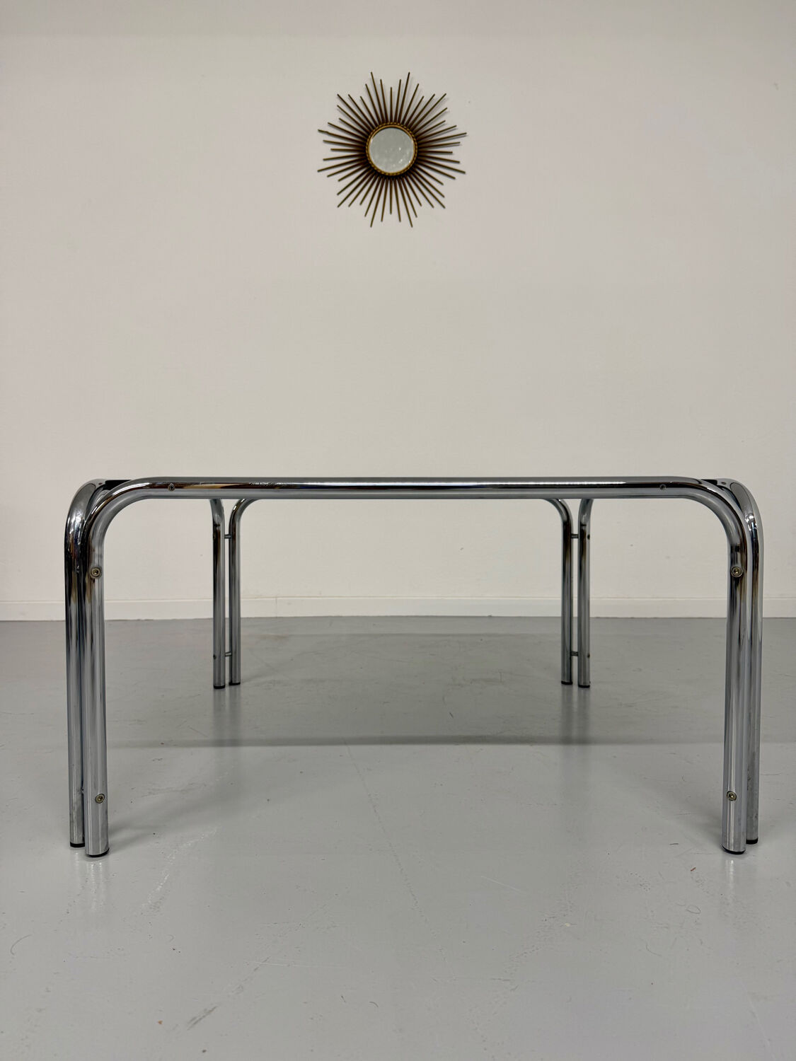 Space coffee table from the 70s, tubular metal and vintage smoked glass