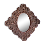 Miroir en bois sculpté et daté 1924