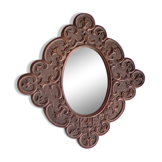Carved wooden mirror and dated 1924