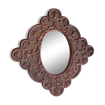 Miroir en bois sculpté et daté 1924