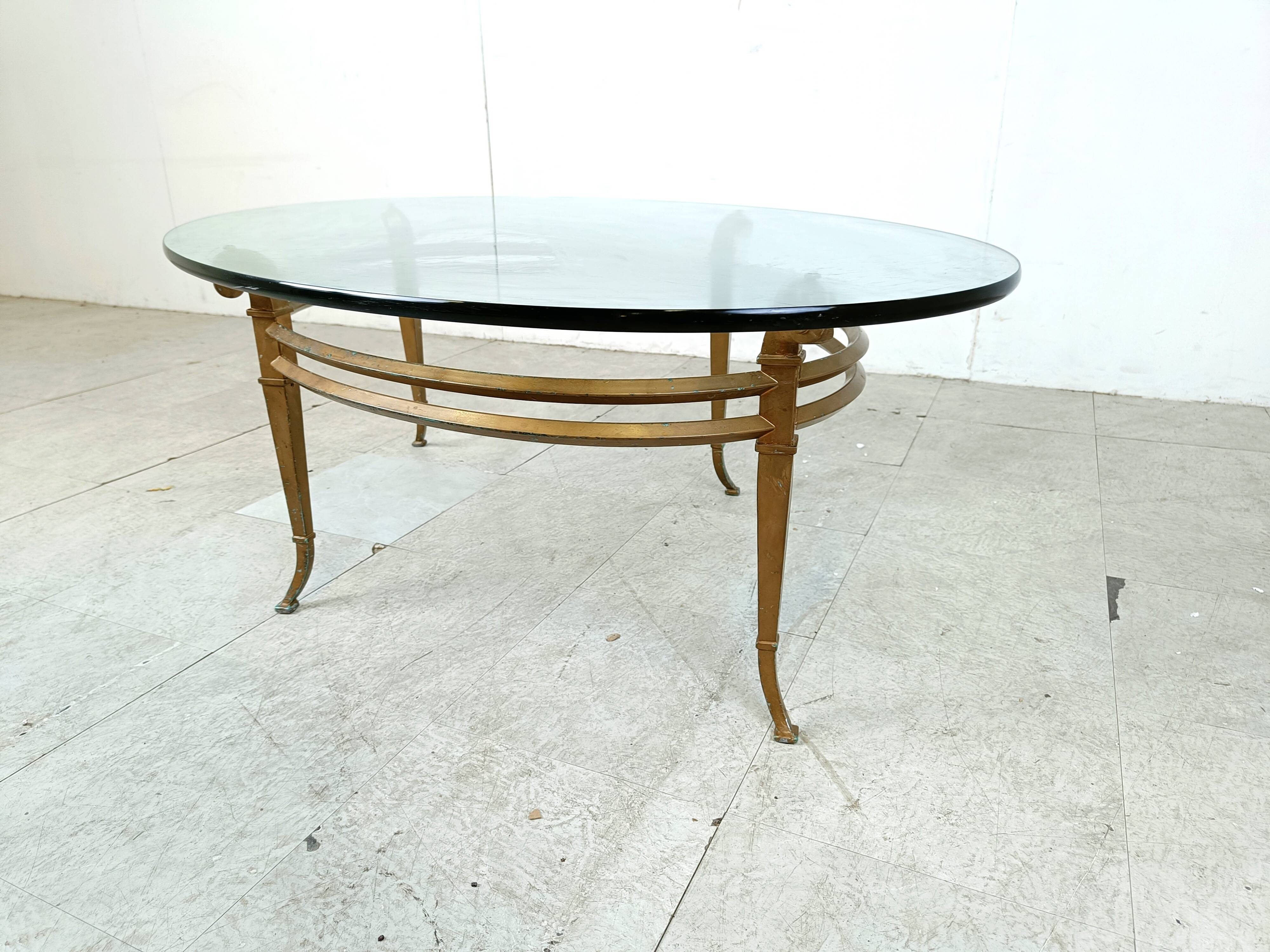Vintage golden metal and oval glass coffee table, 1970s
