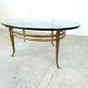 Vintage golden metal and oval glass coffee table, 1970s